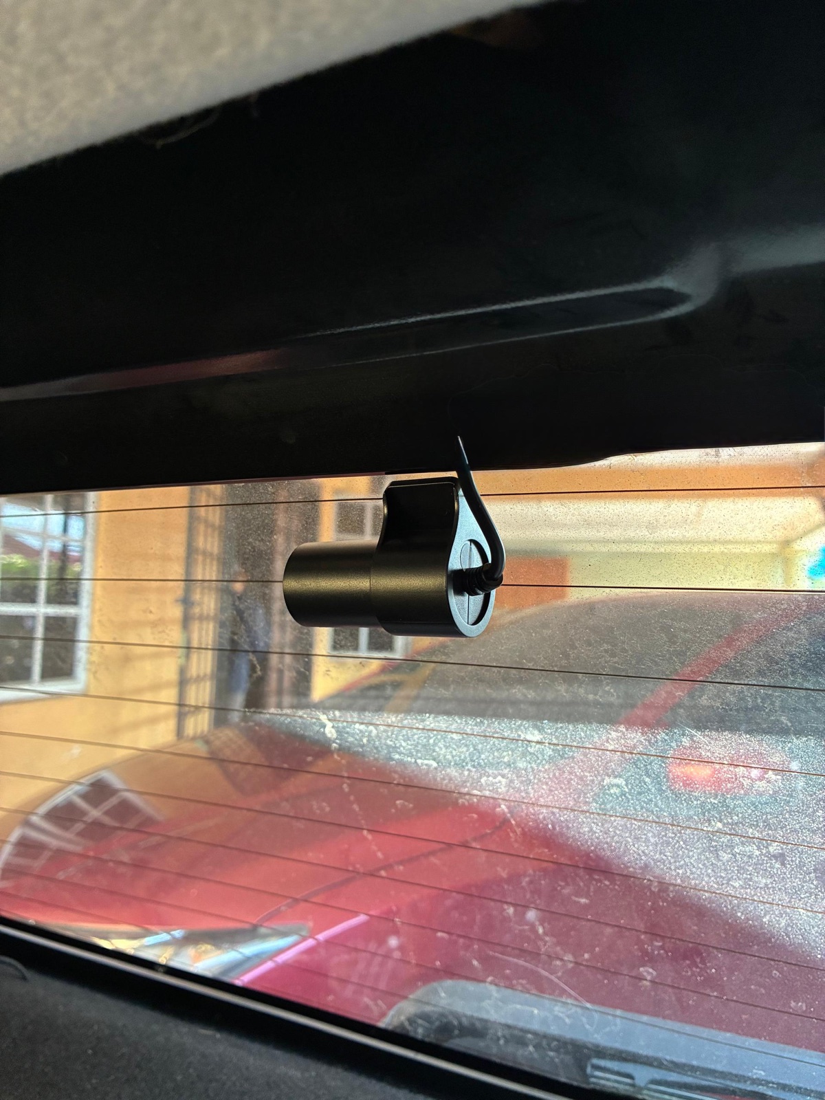 Perodua Myvi — rear-facing dashcam view